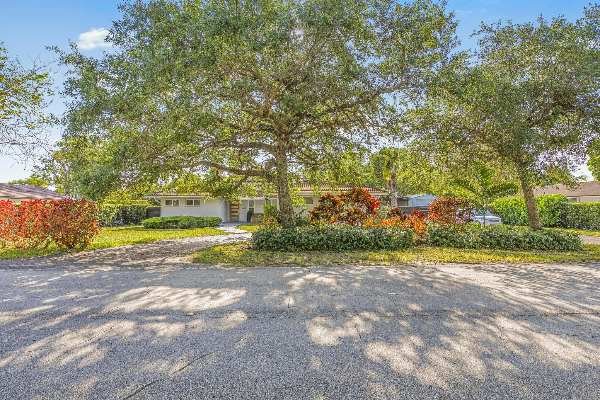 Welcome to your dream home in a highly desirable location! This stunning residence is situated on nearly half an acre! Inside you will discover an inviting floorplan filled with tons of natural light. A spacious functional kitchen, perfect for everyday living and entertaining. Remodeled bathrooms add a touch of modern luxury, while large bedrooms provide plenty of room to relax and recharge. A separate, family room offers additional space for gatherings or movie nights. Outside, find a private oasis with a beautiful backyard featuring a sparkling pool, built-in grilling area, and lime stone floors—ideal for entertaining or relaxing weekends. Impact windows add peace of mind and efficiency. This is the perfect blend of comfort, style, and function—don't miss the chance to make it yours!