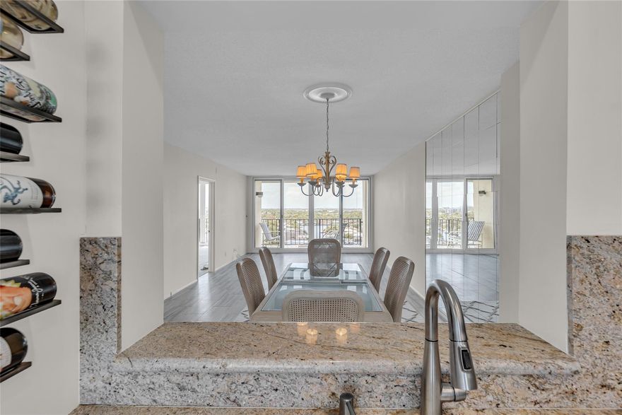 Discover the ultimate coastal lifestyle with this bright, spacious 2BR/2BA unit offering breathtaking views. Wake up to ocean views from kitchen & guest bedroom. Unwind w/serene Intracoastal views from living room & main bedroom. Enjoy sunrises, sunsets, daily boat parades, & the annual Holiday Boat Parade from your balcony. A block to the beach. Close to Fisher Family Pier & Pompano Beach Fishing Village. Easy access to restaurants, entertainment, shopping. Updated kitchen w/granite countertops & stainless-steel appliances. Living area w/neutral tile flooring, newer A/C unit. Impact windows. Secure building w/great amenities: heated pool on the Intracoastal, BBQ area, fitness room, sauna, social room/kitchen, library, common laundry, community dock. You can own this slice of paradise! .