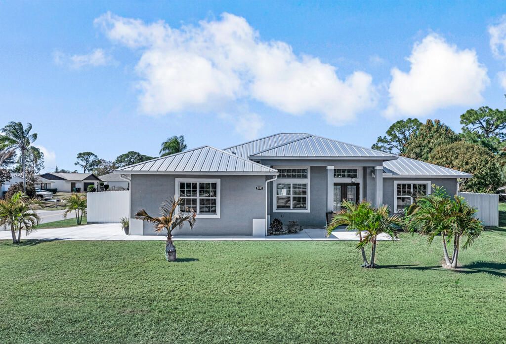 Photo of 2092 SW Airoso Boulevard, Port Saint Lucie, FL 34984 (MLS # R11152990)