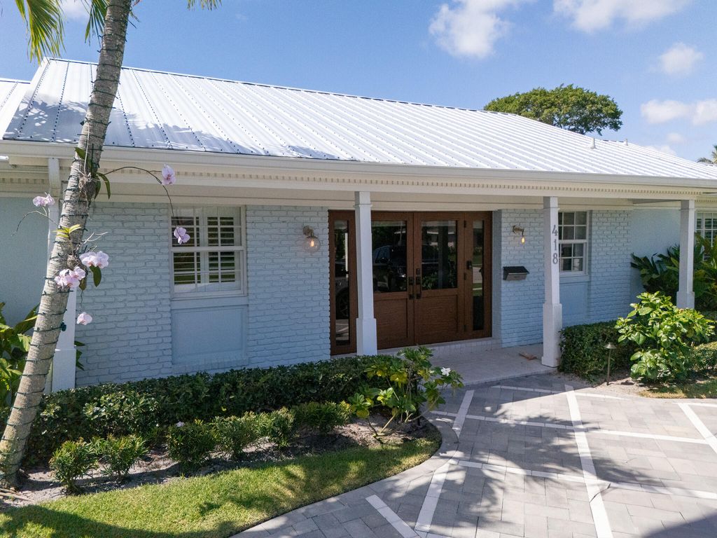 Photo of 418 Oyster Road, North Palm Beach, FL 33408 (MLS # B26031090)