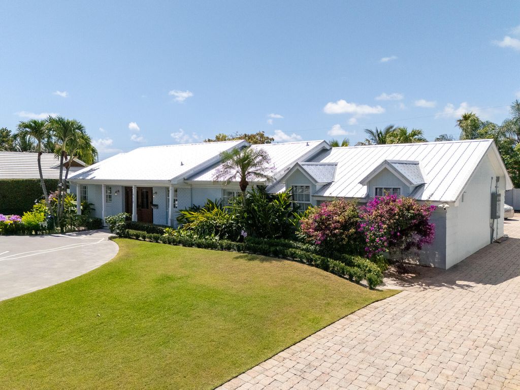 Photo of 418 Oyster Road, North Palm Beach, FL 33408 (MLS # B26031090)