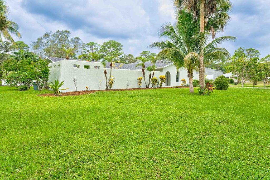 Photo of 10046 175th Road N, Jupiter, FL 33478 (MLS # R10910472)