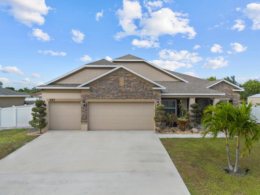 Photo of 487 SW Feldman Avenue, Port Saint Lucie, FL 34953 (MLS # R10937009)