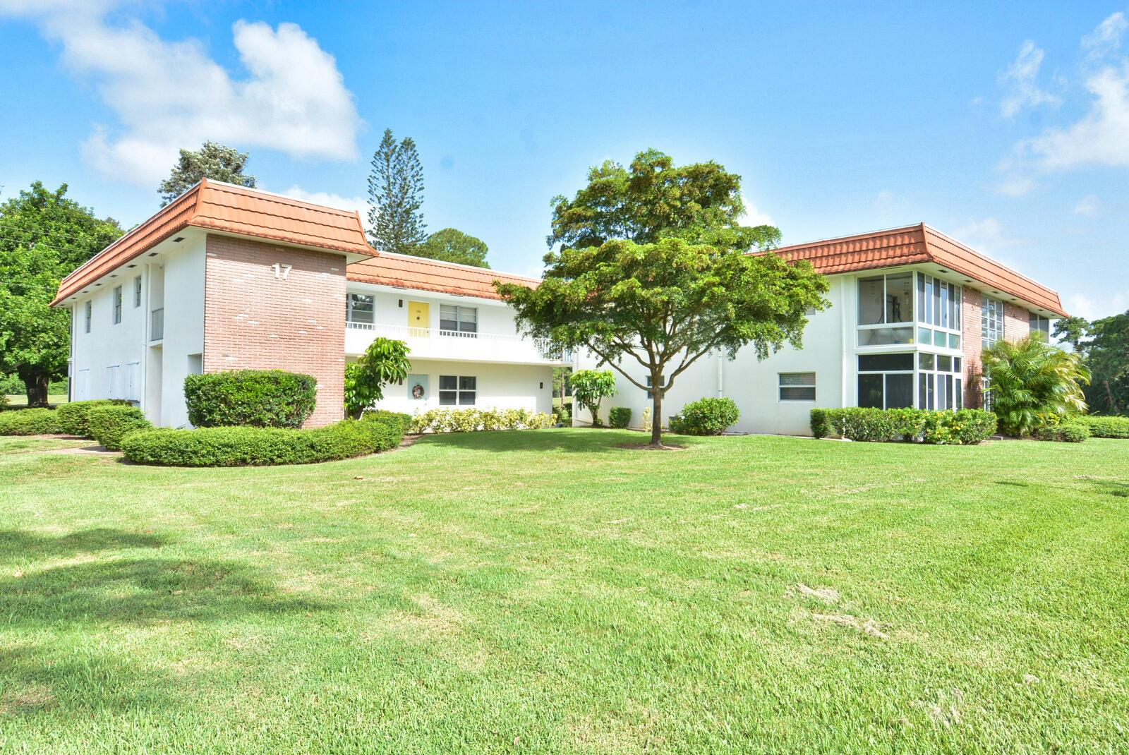 Florida vibes! This 2nd Floor Corner Condo encourages you to relax year-round on your enclosed lanai, perfectly positioned to take in sweeping views of the adjacent North River Shores Golf Course. Enjoy this beautifully maintained 2-bedroom, 2-bath condo with it's updated, open-concept kitchen, dining and living areas, Inside, you'll find laminate floors throughout and updated vanities in both bathrooms. Vista Del Lago is a vibrant 55+ community offering a resort-style lifestyle with a clubhouse, heated pool, library, workshop, and picturesque walking paths set among lush tropical landscaping. Located just minutes from Treasure Coast Mall, Jensen Beach, restaurants, and entertainment, this is Florida living at its best! Please Note: No rentals during the first two years of ownership. No