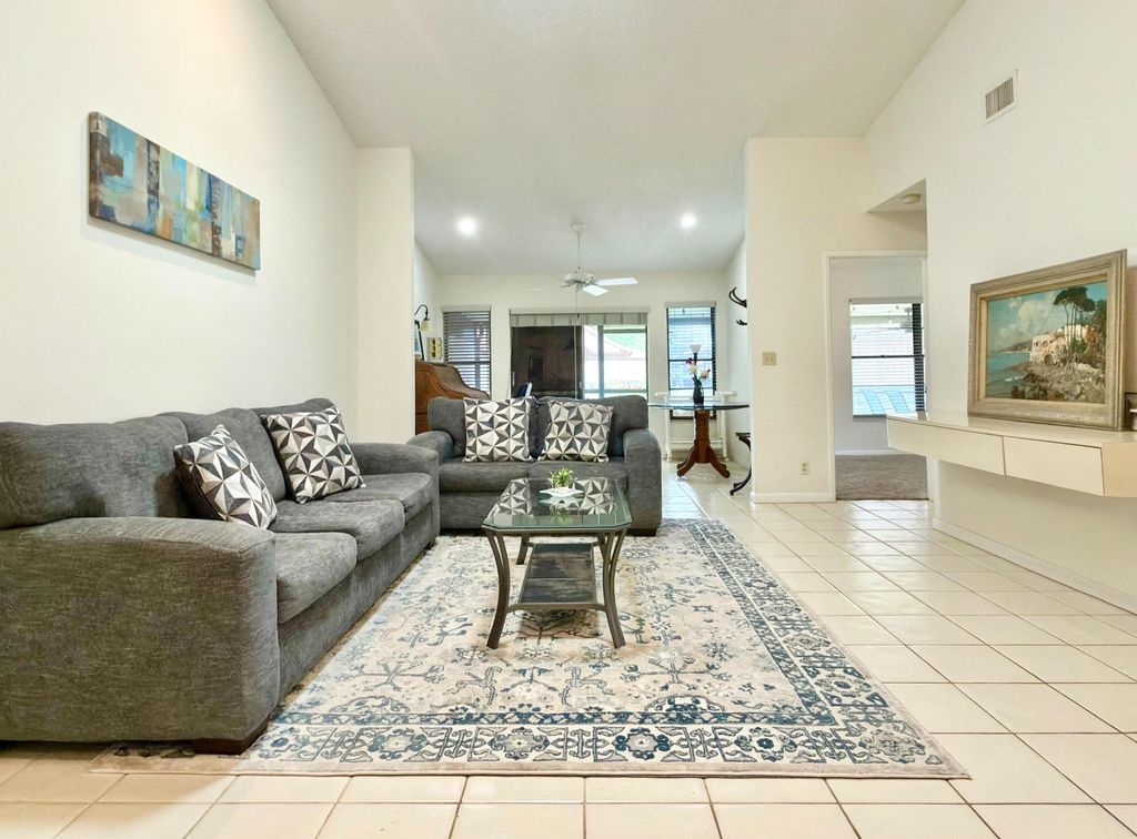 Photo of 10975 Dolphin Palm Court #B, Boynton Beach, FL 33437 (MLS # B26033966)
