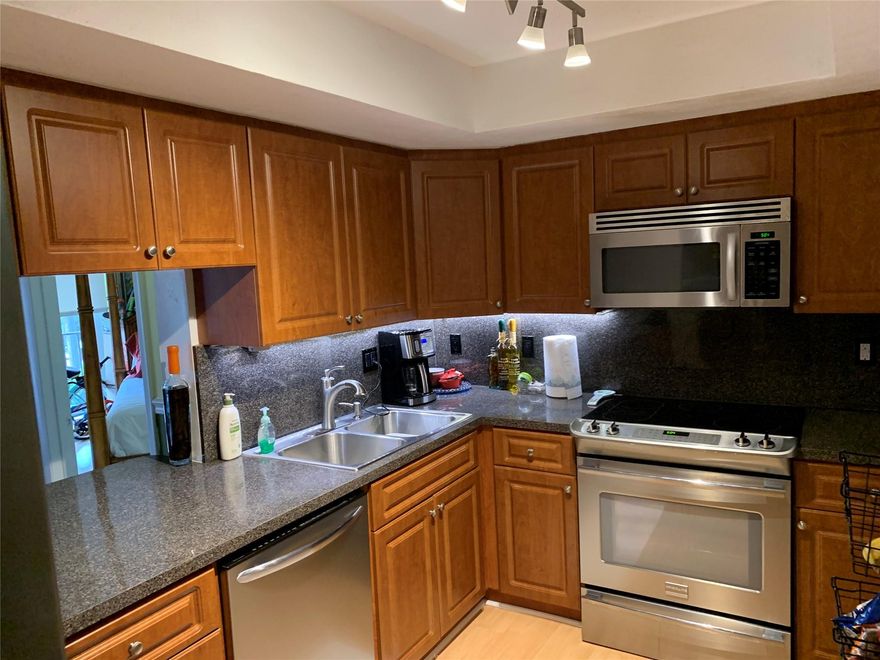 Great location, across strip center with Winn Dixie, Duncan Donut, McDonald, restaurant, HairSalon all walking distance. Also across the street from the beach and all Galt Ocean area. Updated kitchen with SS appliances, large pass through to the living room. Walk out from your living room or bedrooms to 3 attached balconies, great for entertainments. All impact sliding doors. Tankless water heater, extra large storage. Washer/Dryer in the unit  6 year old roof. 40 year inspections done.  Gated complex. NEW  2 Elevators in the middle of the buildings. NO ASSESSMENTS DUE. NO RENTALS. ALL AGES. Move in condition. Pool. Gym. Garage parking.