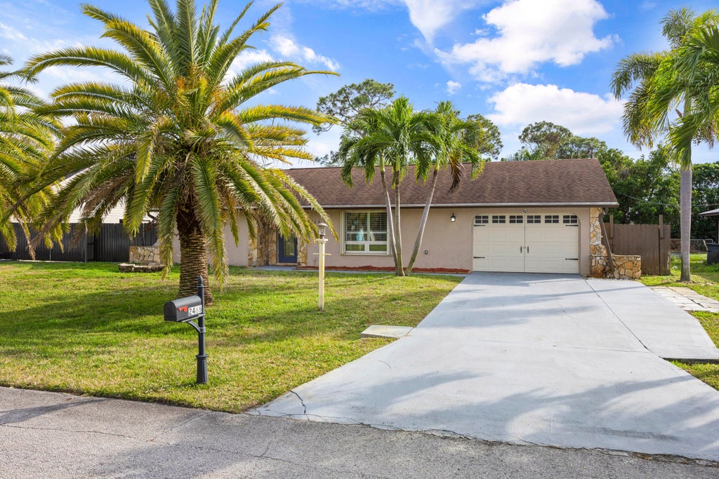 Photo of 2466 SE Pascal Avenue, Port Saint Lucie, FL 34952 (MLS # R11068952)