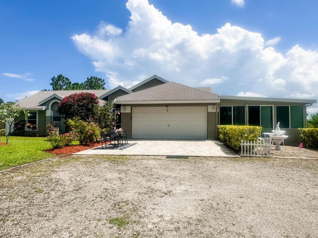 Photo of 16734 91st Place N, The Acreage, FL 33470 (MLS # R10891948)