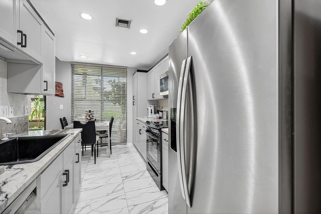 Photo of 7520 La Paz Court #209, Boca Raton, FL 33433 (MLS # F10536620)