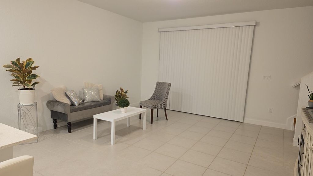 Photo of 512 SE Rivergrass Street, Port Saint Lucie, FL 34984 (MLS # B26015606)