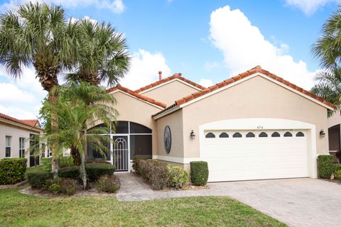 Photo of 454 NW Lismore Lane, Port Saint Lucie, FL 34986 (MLS # B26000756)