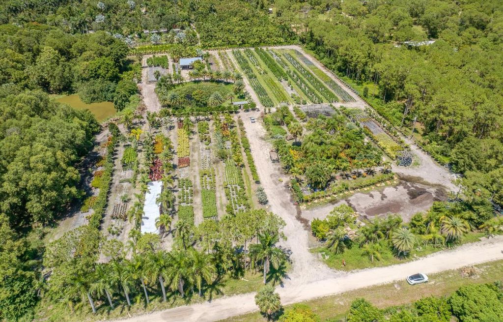 Photo of 12251 146th Place N, Palm Beach Gardens, FL 33418 (MLS # R11116462)