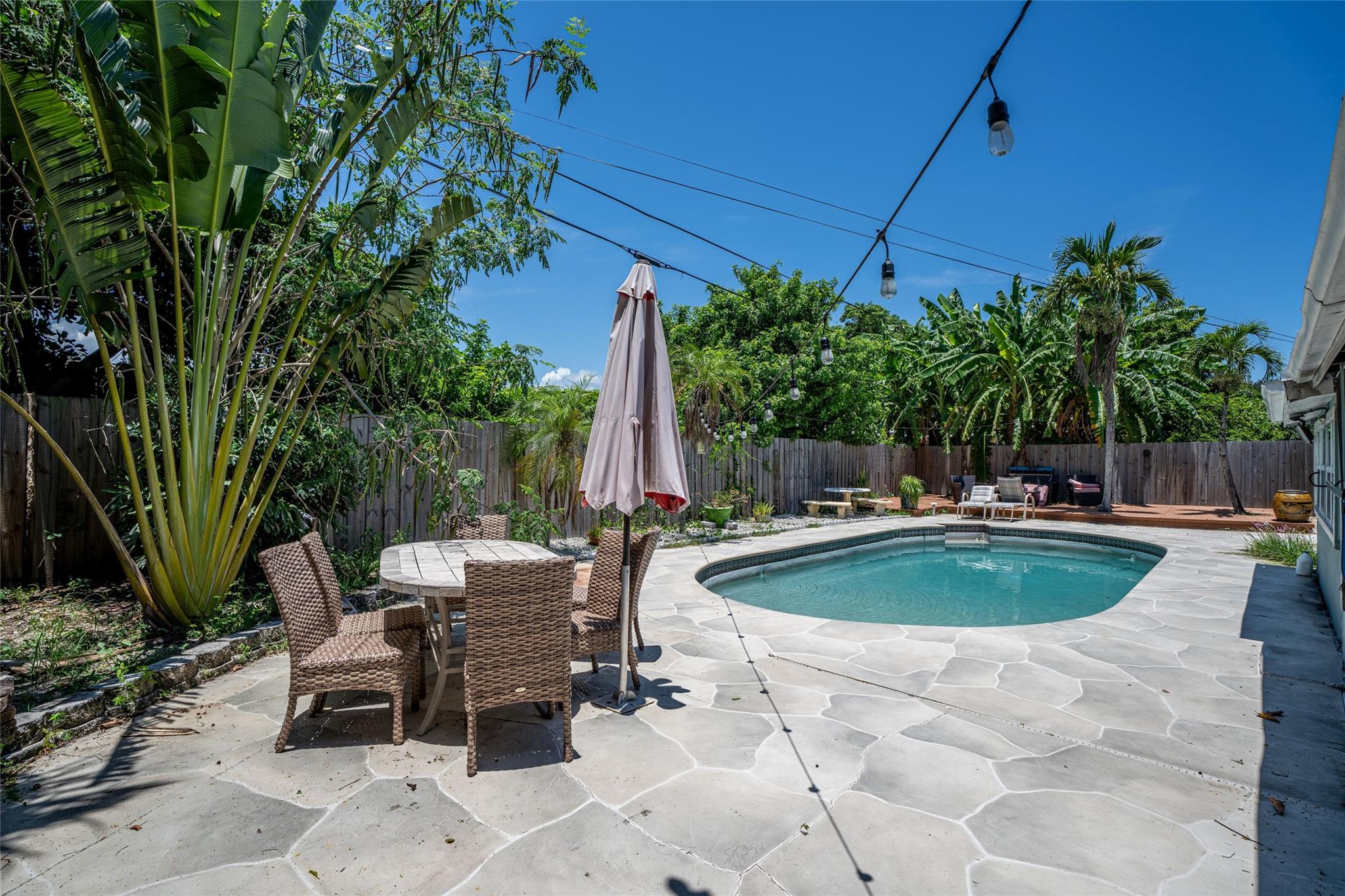 This beautiful 4-bedroom home has been fully renovated from top to bottom! Enjoy a new kitchen and updated bathrooms, along with all-new plumbing and electrical systems. A new AC and water heater has been installed for your peace of mind. The sparkling pool has been resurfaced and comes with a brand-new pump, plus the pool deck has been completely redone—perfect for relaxing or entertaining. Drive way offers plenty of parking. This move-in ready home is close to major highways, gardens mall and has everything you need.