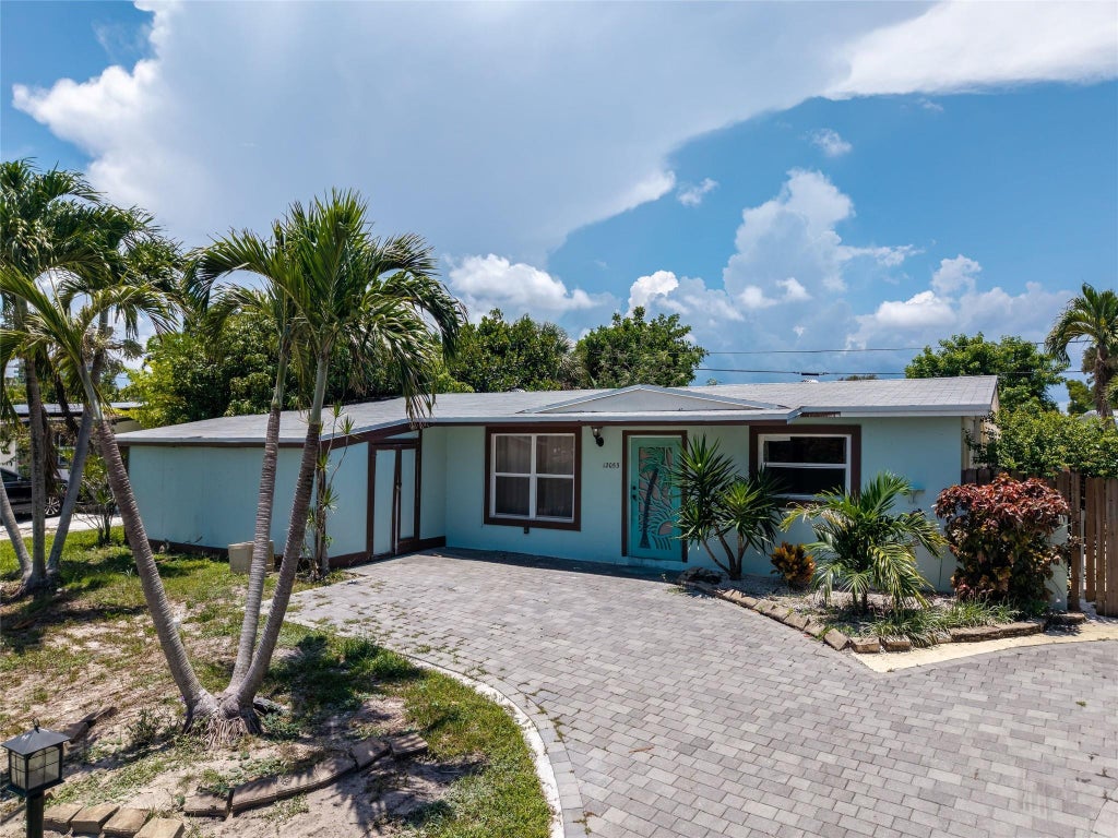 Photo of 12053 Colony Avenue, Palm Beach Gardens, FL 33410 (MLS # F10517811)