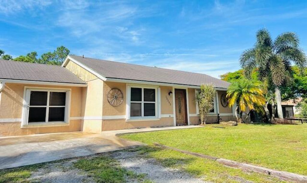 Photo of 15252 74th Street #N, The Acreage, FL 33470 (MLS # R11101069)