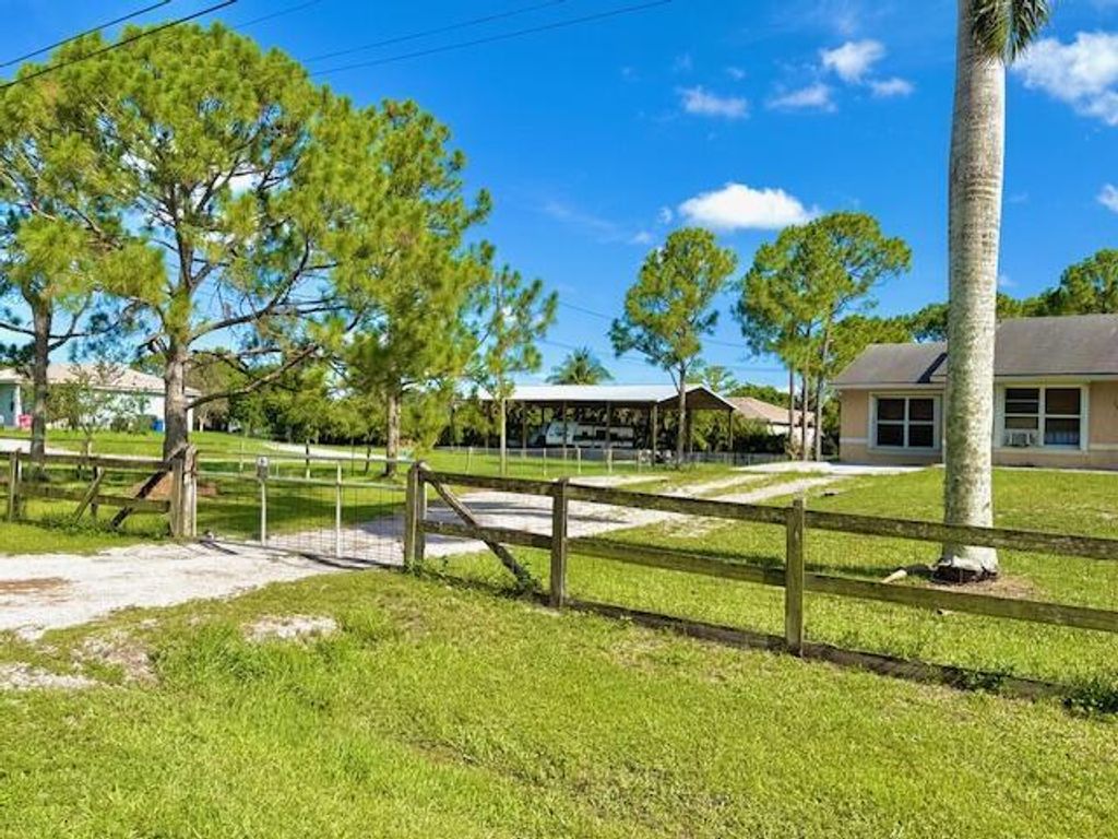 Photo of 15252 74th Street #N, The Acreage, FL 33470 (MLS # R11101069)