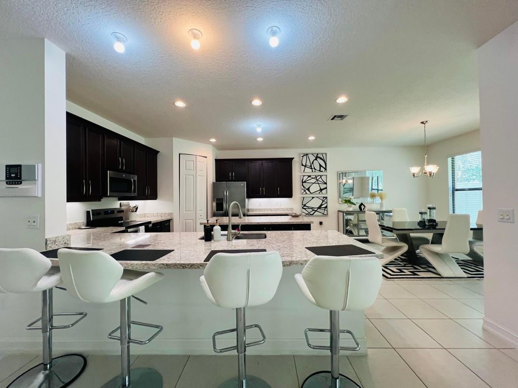 Photo of 14085 Paverstone Terrace, Delray Beach, FL 33446 (MLS # B26018578)