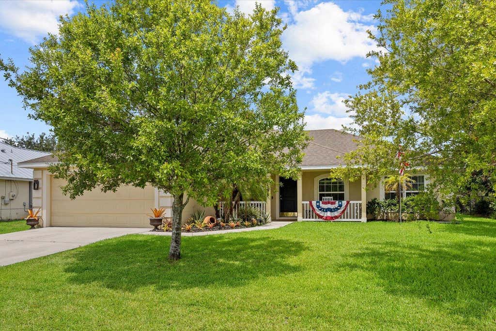 Photo of 2585 SW National Circle, Port Saint Lucie, FL 34953 (MLS # B26039854)