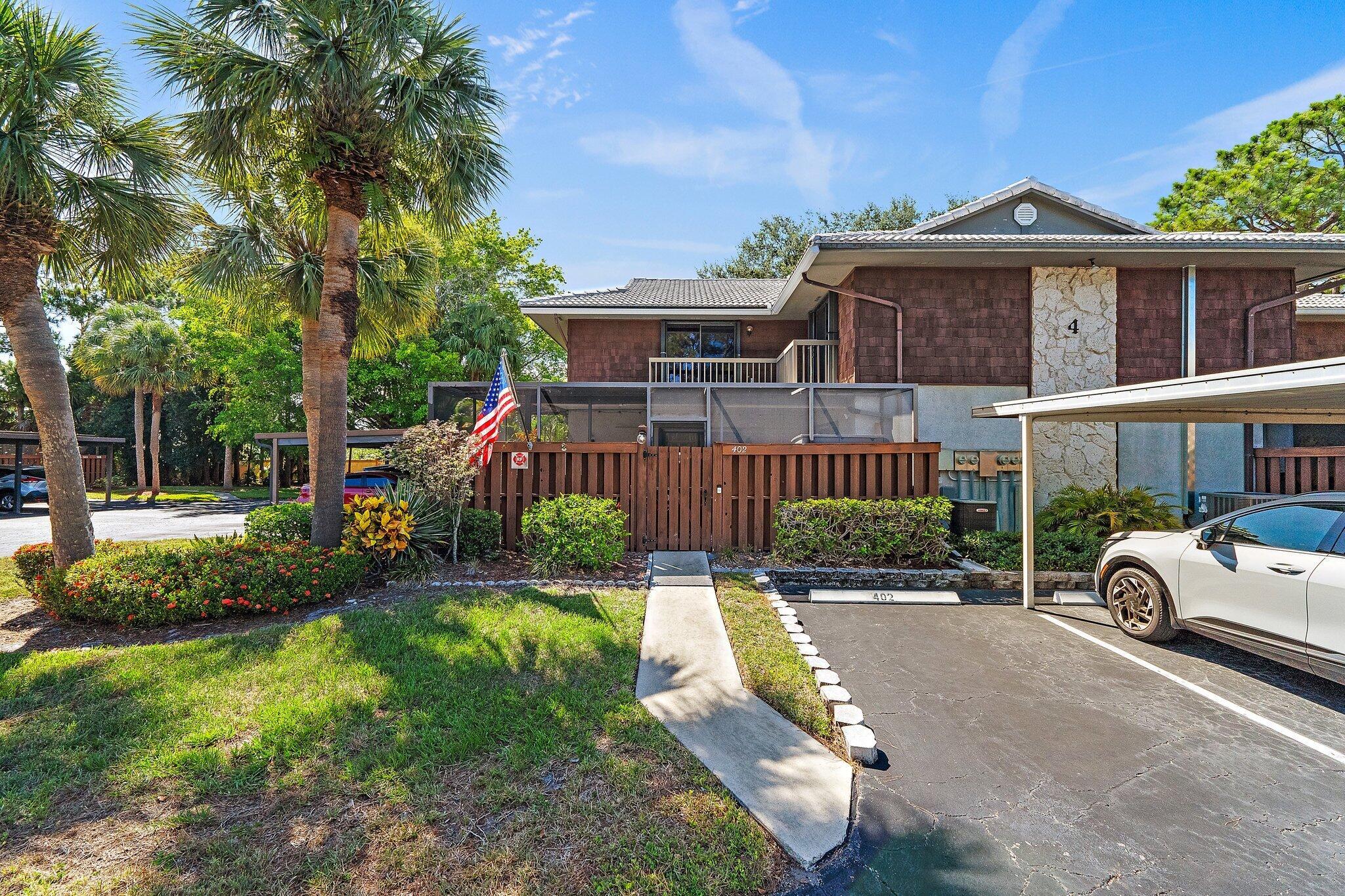 Check out this beautiful 2BED/2.5BATHS townhome featuring new HWH, Dishwasher and NEW Primary Bathroom! This charming home comes with all appliances included and boasts a lovely screened patio. You'll appreciate the convenience of accordion shutters, along with two assigned parking spaces--one covered and one open--plus additional guest parking. For pet lovers, you'll be pleased to know that pets are welcome! The monthly fee covers water, sewer, lawn care, cable, internet, roof replacement, and access to all amenities. Please note, trucks and motorcycles are not allowed. This centrally located gem is close to shops and beaches. Don't miss your chance to see it today!