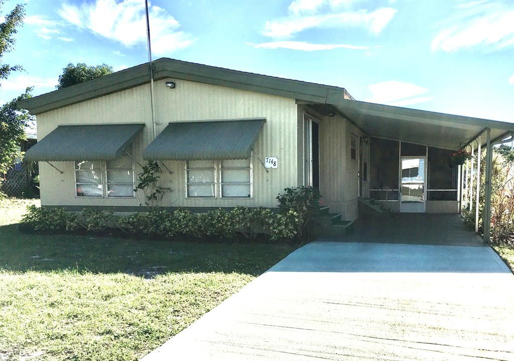 Photo of 7148 SE Seahawk Street, Hobe Sound, FL 33455 (MLS # R10854952)