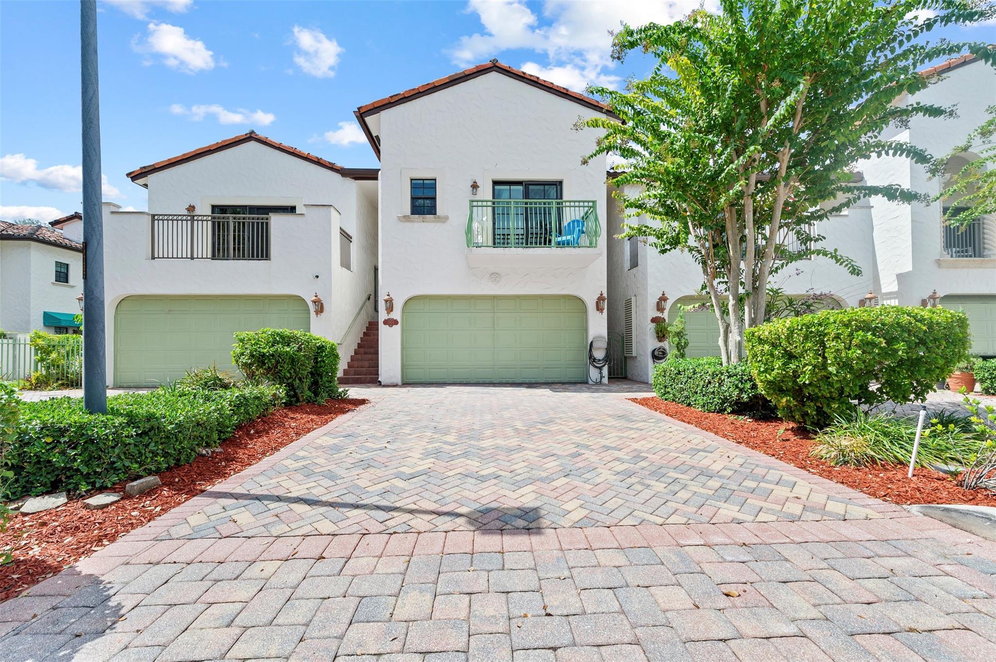 Boater's paradise! This luxurious gated community with a private marina and ocean access is perfect for the boating enthusiast. This unit comes with a dedicated boat slip for vessels up to 34', Water and electric at the dock is included. Dual zone A/C, SS appliances, and granite countertops in kitchen and baths. Hardwood cabinets, hurricane impact windows and doors, with a private balcony in the primary bedroom and living room. The 2 car garage has a high end epoxy finish. Home also boasts a large driveway and private courtyard. Enjoy a full fitness center with weight machines, treadmill, elliptical and bike. HOA includes: Marina w/elec and water (huge savings!), gym, pool, Exterior insurance, basic cable, landscaping & ROOF! Additional marina next to community with parking/boat ramp.