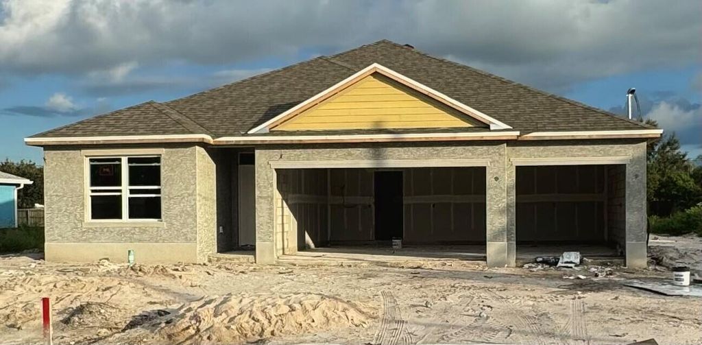 Photo of 2255 SE Rock Springs Drive, Port Saint Lucie, FL 34952 (MLS # R11006526)