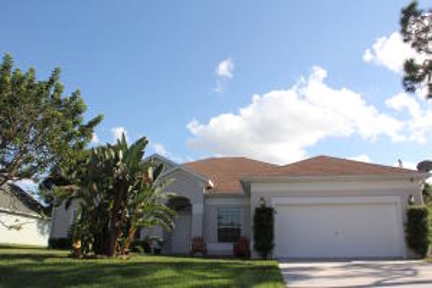 Beautiful 4/3/2 Salt Water Pool home. This beauty features a big fenced in yard with sprinkler system, covered patio and paved pool area. Perfect for entertaining and relaxation. Interior features include spacious kitchen area with granite counter tops, island, and top of the line Stainless steel appliances. Amazing layout with tile throughout living areas and laminate wood floors in bedrooms. Master bedroom includes his and hers closets, space for a sitting area with pool view and access from sliding glass doors. Master bath features his and hers sinks, Roman tub, and separate shower. One of the guest bathrooms is a cabana bath... A great feature for a pool home. With this stunning home it's all in the details. A must see!