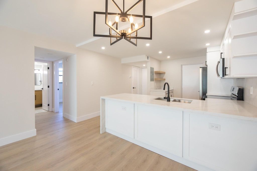 Photo of 2322 S Cypress Bend Drive #411, Pompano Beach, FL 33069 (MLS # F10555836)