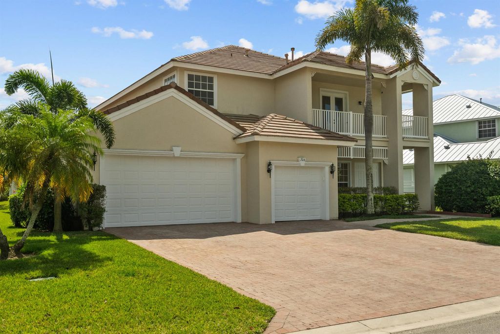 Photo of 206 NW Magnolia Lakes Boulevard, Port Saint Lucie, FL 34986 (MLS # R11030614)