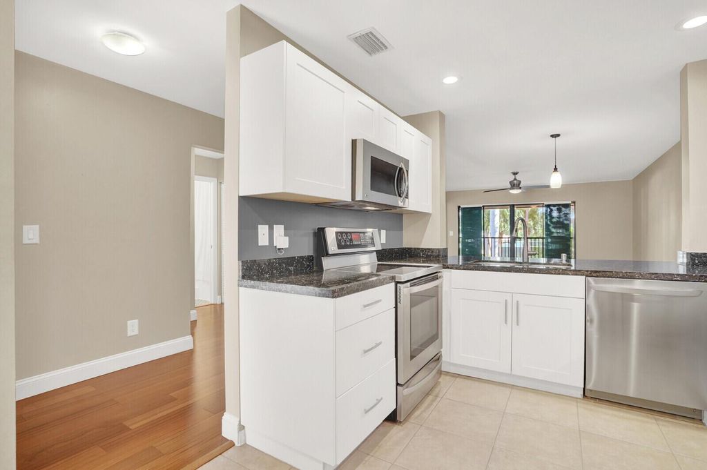 Photo of 100 Pelican Pointe Drive #202, Delray Beach, FL 33483 (MLS # R11145832)