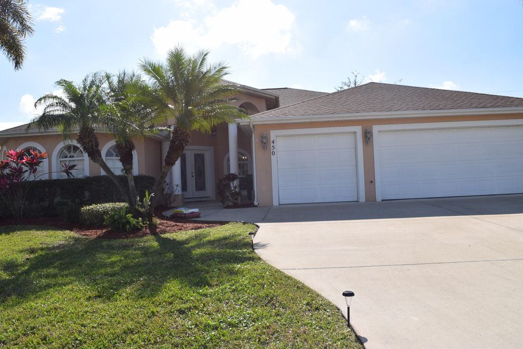 Photo of 450 SW Fields Avenue, Port Saint Lucie, FL 34953 (MLS # R10783121)