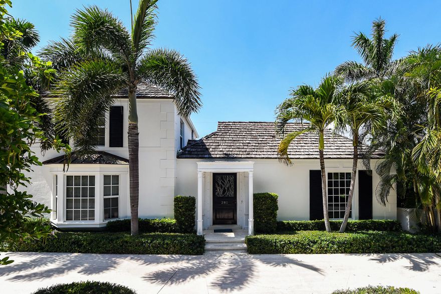 Light and bright 4BR/3BA North End home on oversized lot. This home features first floor owner's suite, formal dining room, and family room that leads to private tropical pool.  Close proximity to the Lake Trail and beach.