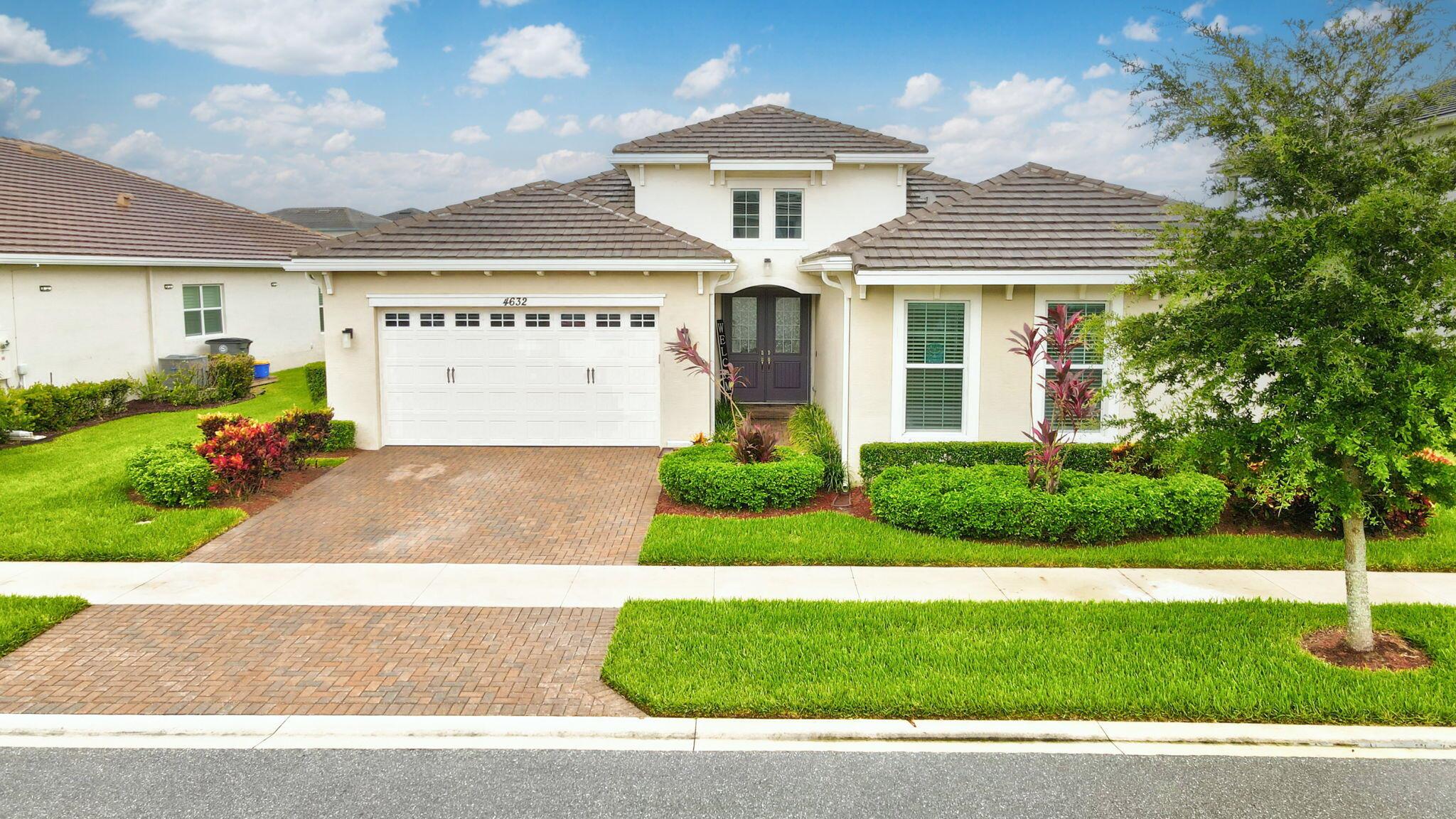 Spacious Ranch-Style Home with Ideal Split Floor Plan in Westlake's Groves Community Welcome to this expansive 4-bed, 4-bath Kingfisher Grand model with den and 2-car garage, offering over 3,000 sq ft of thoughtfully designed living space in Westlake--the fastest-growing neighborhood in South Florida. This ranch-style home features a highly desirable split floor plan with incredible flow. Wood-look tile in soft gray tones connects the open-concept kitchen, family room, great room, dining area, and breakfast nook, all bathed in natural light from sliding glass doors that lead to the covered lanai. The chef's kitchen is a standout with natural gas, granite countertops, wood shaker cabinets, and premium appliances including a double oven and French-door fridge. The private master suite offer