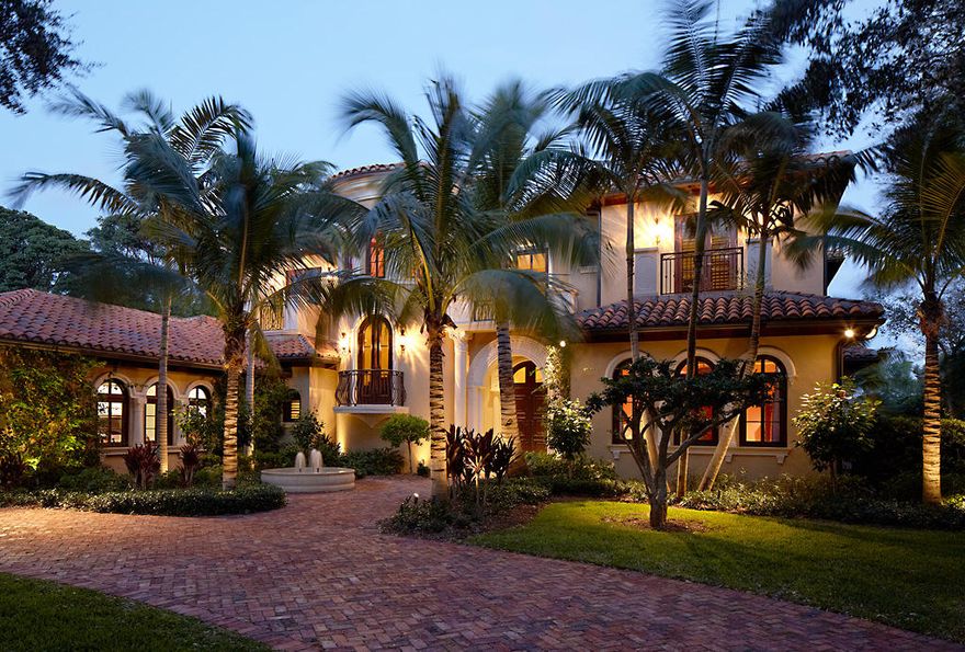 A true custom estate, situated on 1.2 acres, this home was built with the highest level of fit and finish including unexpected details such as hand carved marble columns and door surrounds. Jerusalem stone floors with a captivating mix of mahogany inlays and detailed tile patterns, and solid Honduran mahogany doors and millwork throughout. The beautiful , large gourmet kitchen and family room is adjacent to the bar/billiard room and home theater, and a screened in summer kitchen with fire pit. An infinity edge pool and spa are accompanied by the lush landscaping and unique changes in elevation. Bring your most discriminating buyers, home shows like a model.