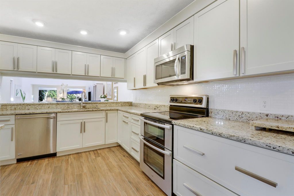 Photo of 12879 SE Berwick Court, Hobe Sound, FL 33455 (MLS # R10946956)