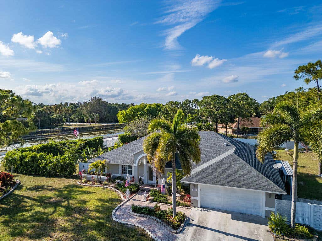 Photo of 12987 N 66th Place N, The Acreage, FL 33470 (MLS # B26046363)