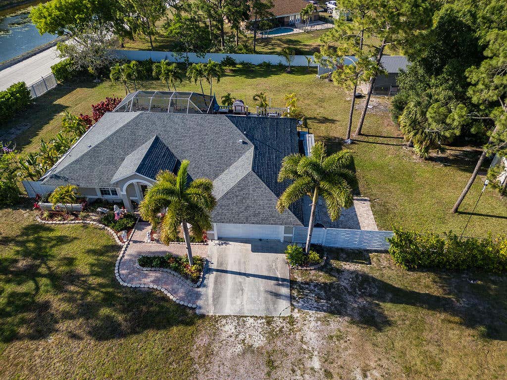 Photo of 12987 N 66th Place N, The Acreage, FL 33470 (MLS # B26046363)