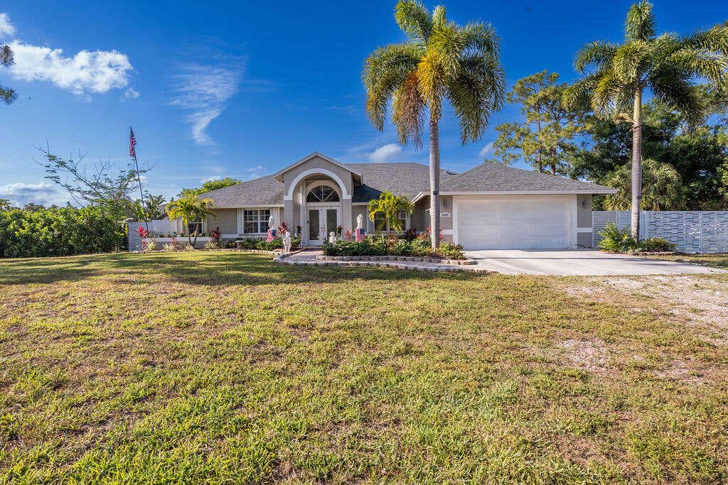 Photo of 12987 N 66th Place N, The Acreage, FL 33470 (MLS # B26046363)