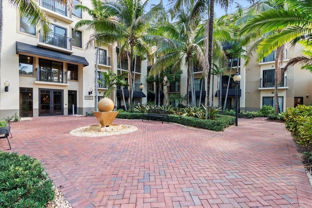 Photo of 4907 Midtown Lane #1111, Palm Beach Gardens, FL 33418 (MLS # R10876653)