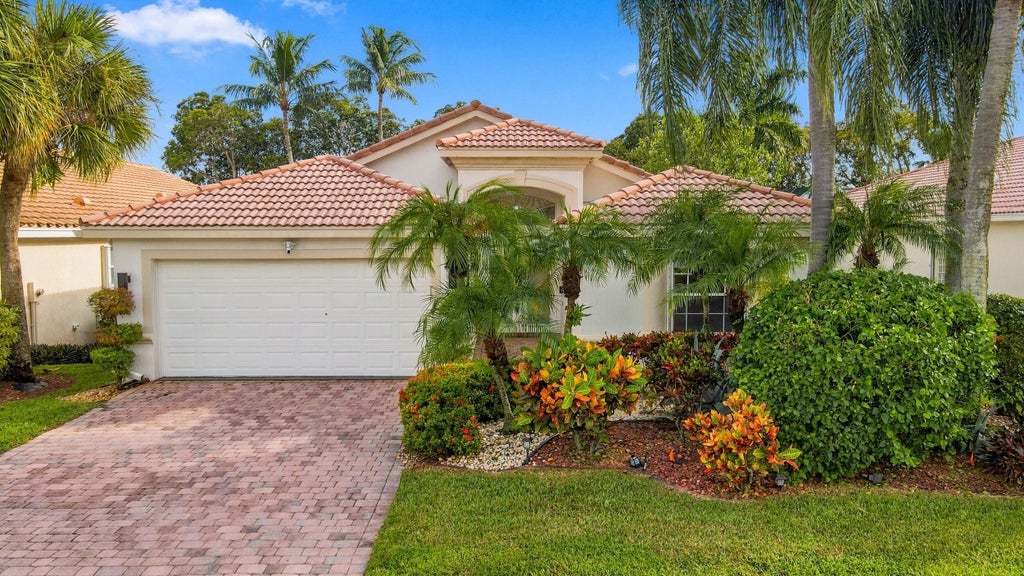 Photo of 9576 Taormina Street, Lake Worth, FL 33467 (MLS # B26083880)