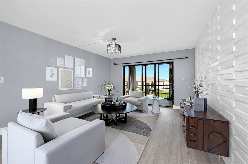 UPGRADED TOP FLOOR CORNER UNIT with Sunset Views! Imagine no neighbors upstairs, a serene golf/sunset view, and beautiful interior designs in a modern 2/2 condo in Boca Raton. ALL AGES - BEST SCHOOLS. This is the best unit in the building, offering privacy and tranquility.  This home features a fully renovated kitchen with new cabinetry, granite countertops, and stainless-steel appliances. Enjoy the warmth of luxury vinyl wood flooring, freshly painted interiors, decorative accent walls, elegant light fixtures throughout, ample closet space and a large enclosed screened patio, perfect for relaxing or entertaining. Located in the desirable Boca Dunes community, zoned for top-rated A schools, and close to shopping, dining, and major highways. Won't last! Virtually staged.