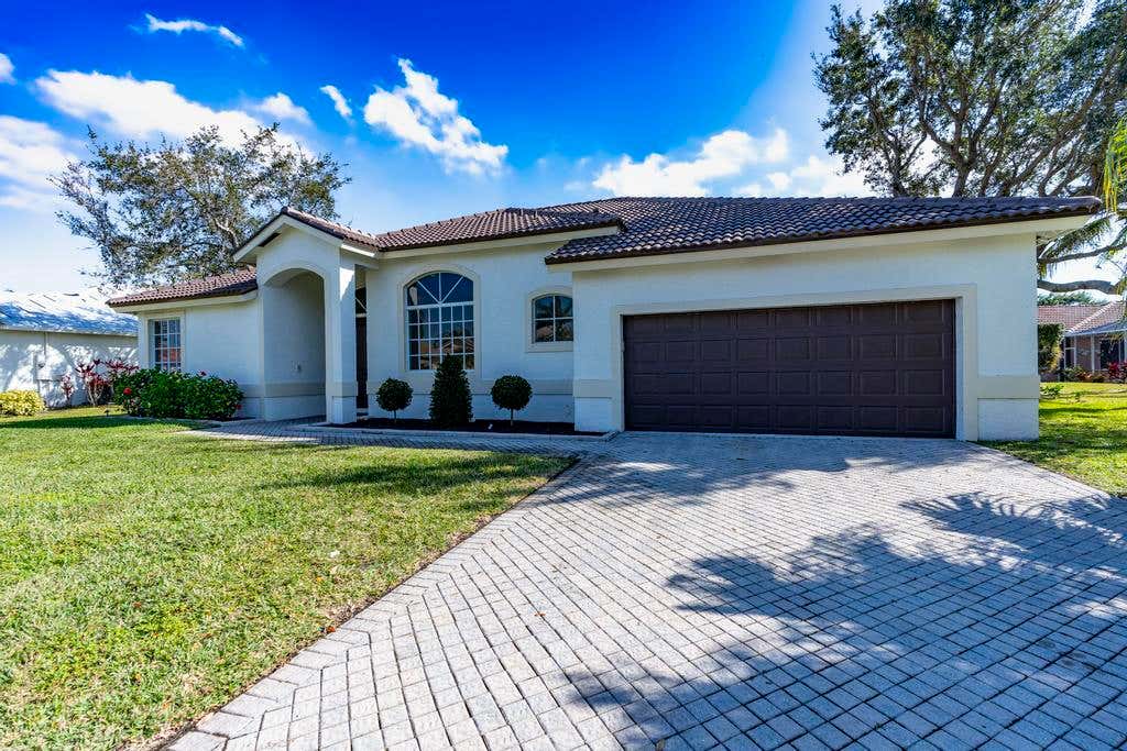 Photo of 1255 SW Maplewood Drive, Port Saint Lucie, FL 34986 (MLS # B26056399)