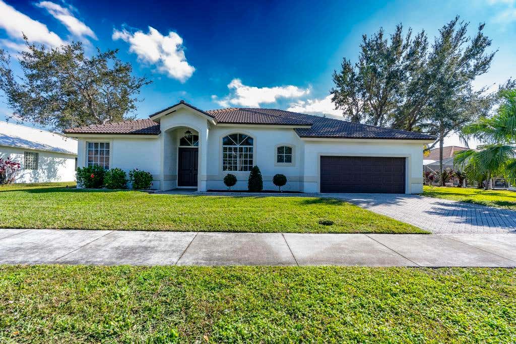 Photo of 1255 SW Maplewood Drive, Port Saint Lucie, FL 34986 (MLS # B26056399)