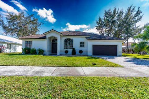 Photo of 1255 SW Maplewood Drive, Port Saint Lucie, FL 34986 (MLS # B26056399)