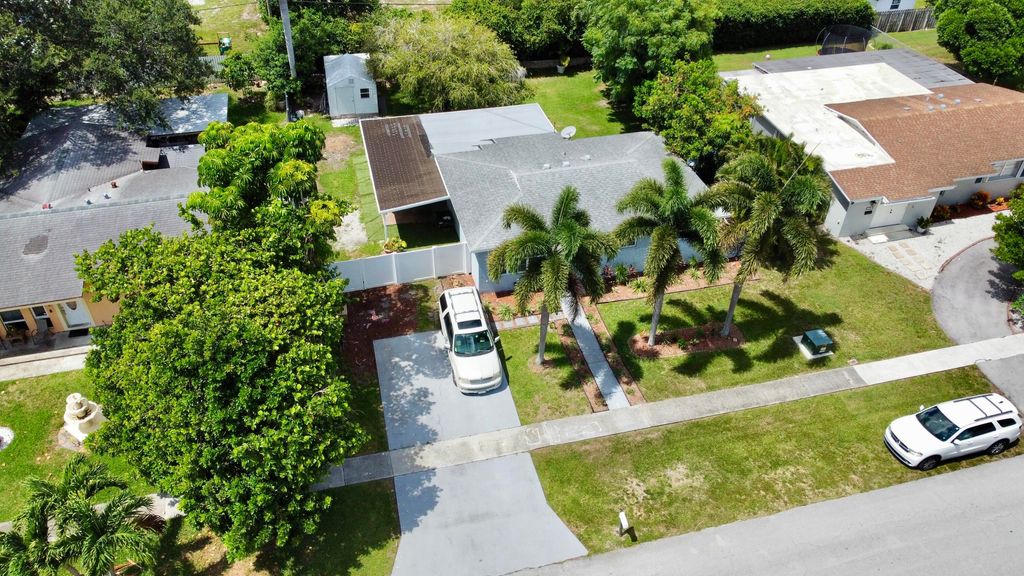 Photo of 344 Shady Lane Road, Palm Springs, FL 33461 (MLS # R10985022)