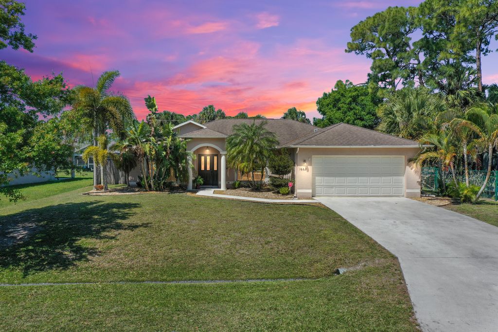 Photo of 1662 SW Rutland Street St, Port St Lucie, FL 34987 (MLS # R10788557)