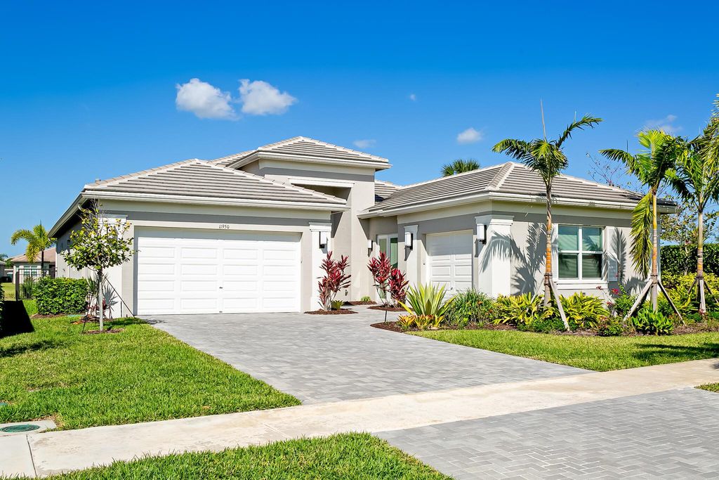 Photo of 11950 SW Laguna Bay Parkway, Port St Lucie, FL 34987 (MLS # R10973846)