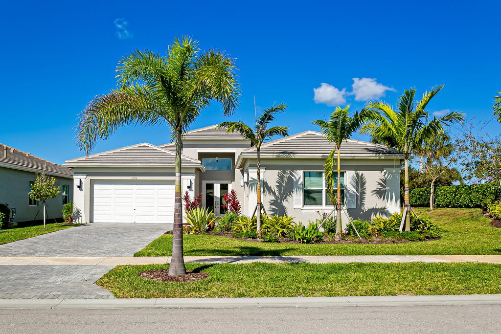 Photo of 11950 SW Laguna Bay Parkway, Port Saint Lucie, FL 34987 (MLS # R10973846)