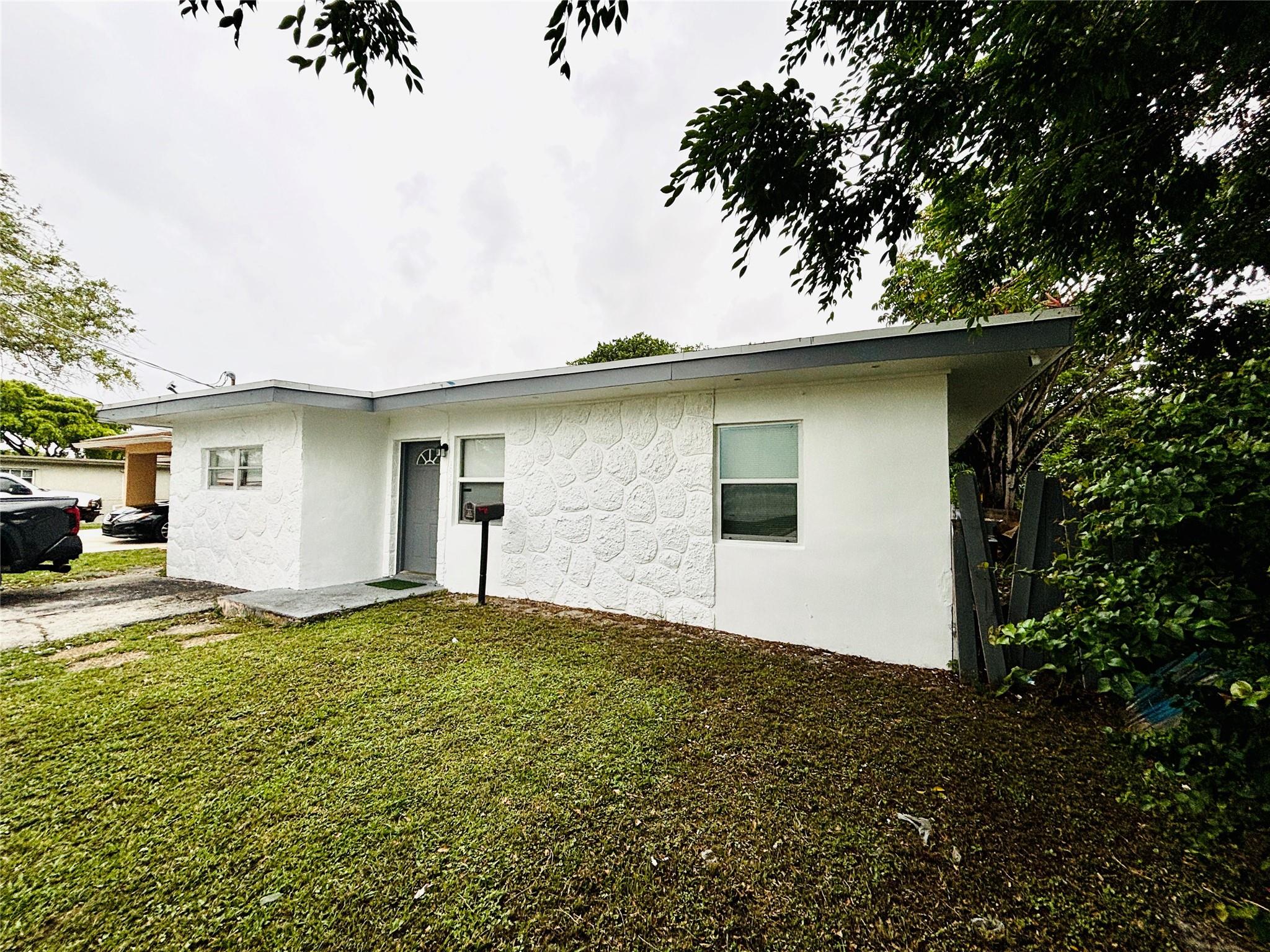 Welcome to your new home. This lovely two-bedroom, one-bathroom features a refreshing pool and a large backyard, perfect for outdoor fun and relaxation. Enjoy a spacious living area and a cozy atmosphere. Conveniently located near schools and parks, shopping centers . five minutes away from I-95. The property is vacant and on lockbox, very easy to show. Please call or text the listing agent if you have any questions: