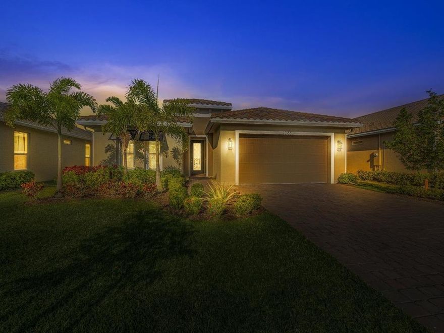 Enjoy premier 55+ living with this 2 bedroom + flex room and 2 bathroom + extended garage home located in Vitalia at Tradition! Amazing upgrades and finishes throughout including complete impact glass, formal dining space, spacious great room, ceramic tile flooring, and large extended lanai! The open concept kitchen features granite countertops with large kitchen island, a gas range, double wall ovens, and stainless appliances! The Vitalia HOA fee includes: a clubhouse, swimming pool, exercise room, putting green, cable TV, high-speed internet, alarm monitoring, landline, guarded gate, water for irrigation, on-site property manager, staffed clubhouse. Tradition is a master planned community and features great dining and shopping, and recreation. Just Minutes from Cleveland Clinic and I-95.